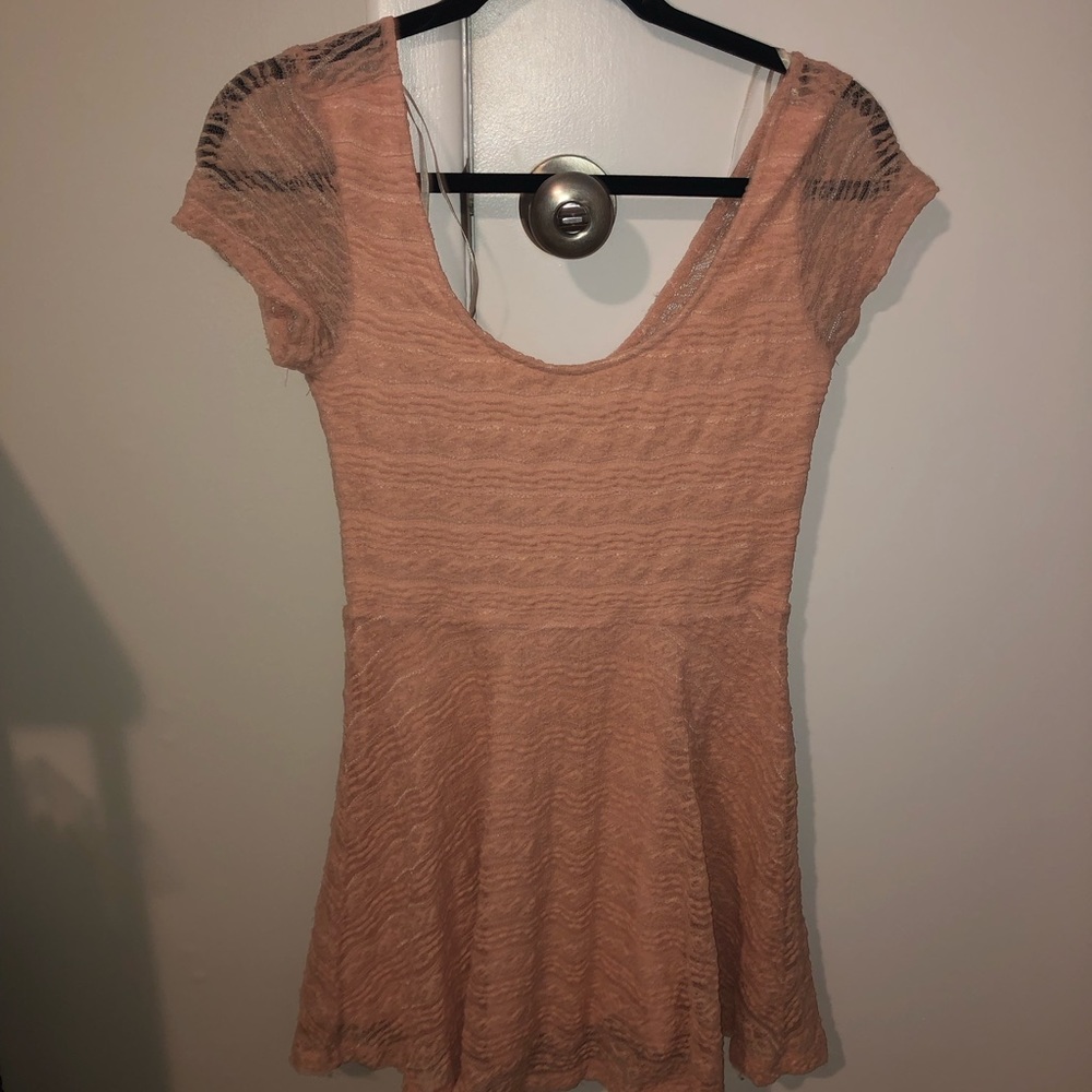 pink, lace dress. about finger tip length